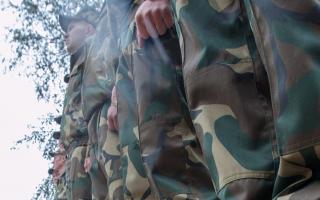 Who in Belarus helps to avoid military service?